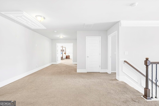 unfurnished room with light colored carpet