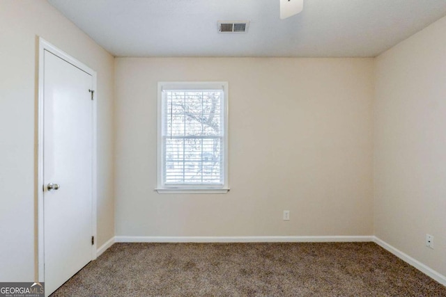 view of carpeted spare room