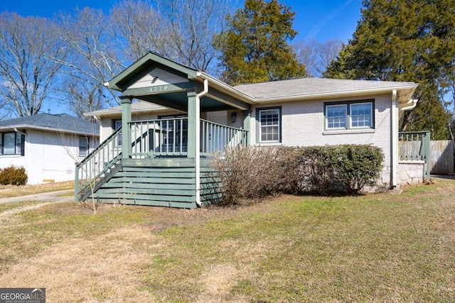 bungalow with a front lawn