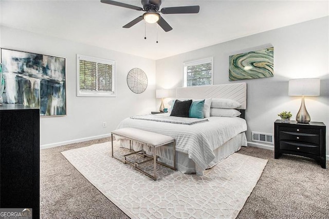 carpeted bedroom with ceiling fan