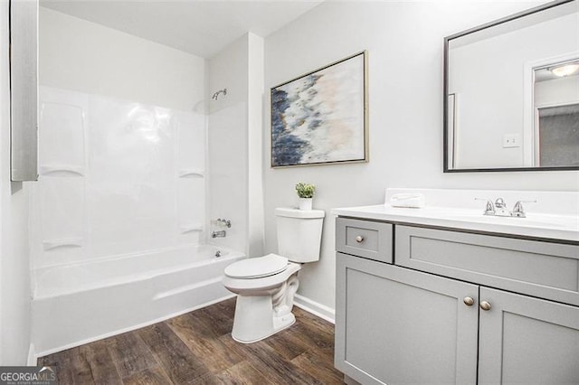 full bathroom featuring shower / tub combination, wood-type flooring, vanity, and toilet