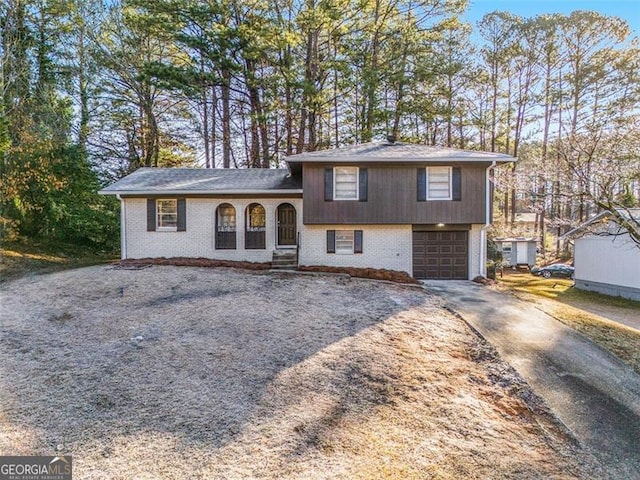 split level home featuring a garage