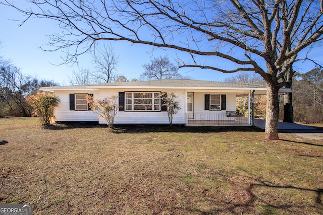 single story home with a porch and a front yard