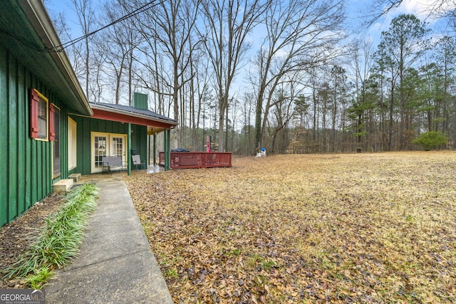 view of yard with a deck