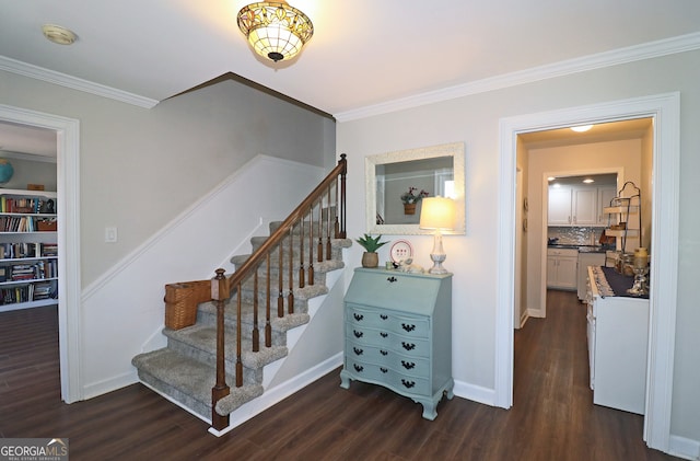 stairway featuring crown molding and hardwood / wood-style floors