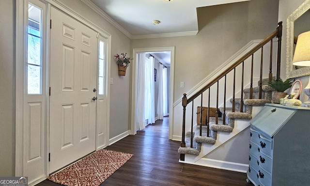 entrance foyer with crown molding and dark hardwood / wood-style floors