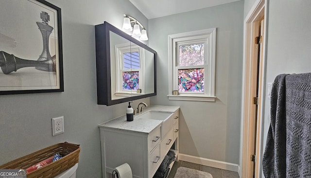 bathroom featuring vanity and tile patterned flooring