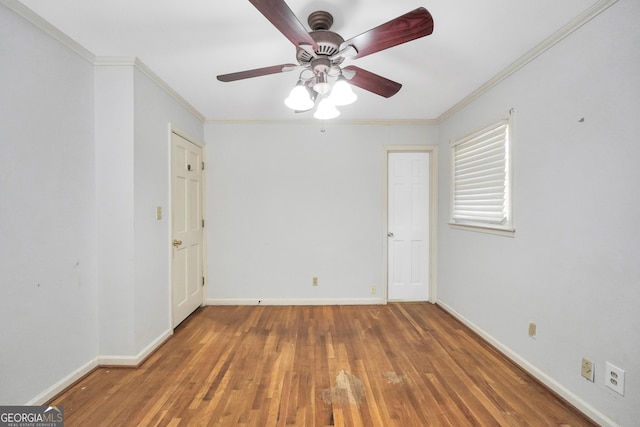 105 Skyline Dr, Barnesville, GA 30204 - empty room featuring baseboards, ornamental molding, and wood finished floors