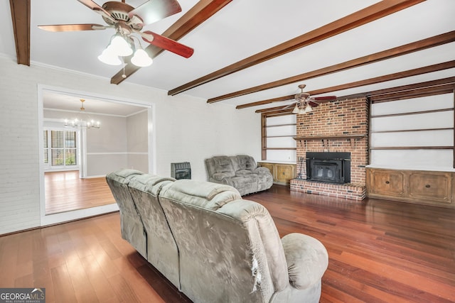 105 Skyline Dr, Barnesville, GA 30204 - living area with brick wall, ornamental molding, wood finished floors, and beamed ceiling