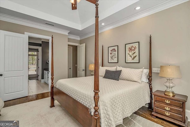 bedroom with recessed lighting, wood finished floors, visible vents, ornamental molding, and ceiling fan