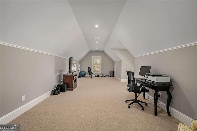 home office with baseboards, vaulted ceiling, visible vents, and carpet