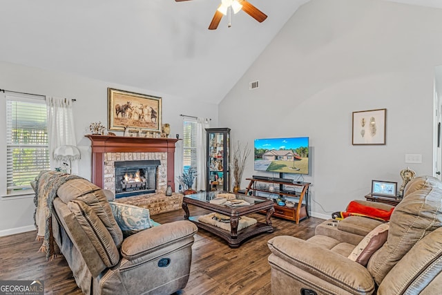 living room with a brick fireplace, high vaulted ceiling, dark hardwood / wood-style floors, and ceiling fan