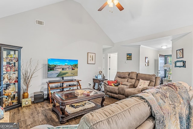 living room with wood-type flooring, ceiling fan, and high vaulted ceiling