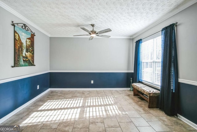 unfurnished room featuring ceiling fan, ornamental molding, and a textured ceiling