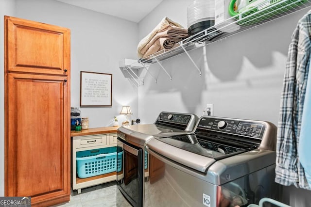 laundry room with washer and clothes dryer