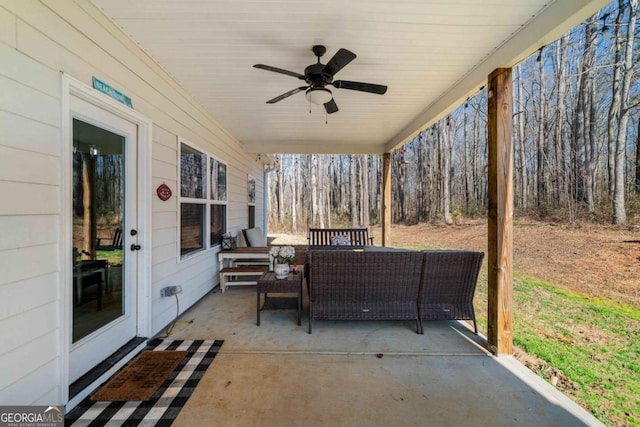 view of patio / terrace featuring ceiling fan and an outdoor hangout area