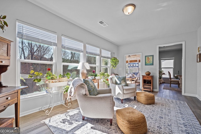 interior space featuring hardwood / wood-style floors and a wealth of natural light