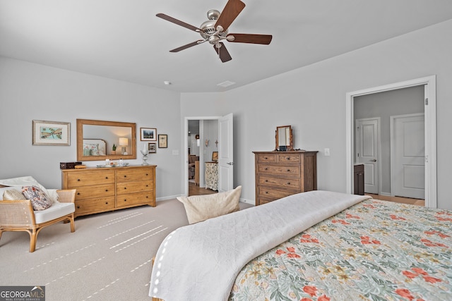 carpeted bedroom featuring ceiling fan