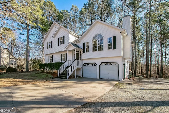 view of front of property with a garage