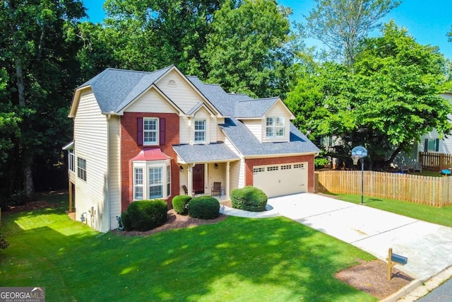 view of front facade with a garage and a front lawn