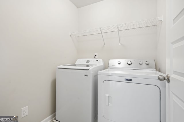 washroom featuring separate washer and dryer