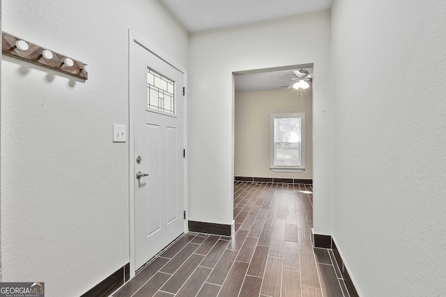 entryway featuring ceiling fan