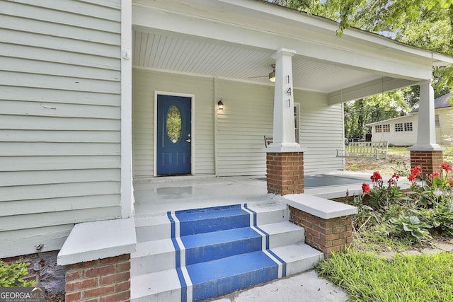 doorway to property featuring covered porch