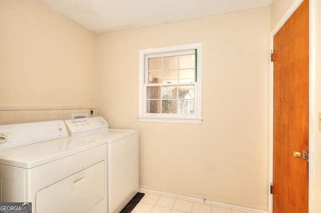 laundry area featuring independent washer and dryer