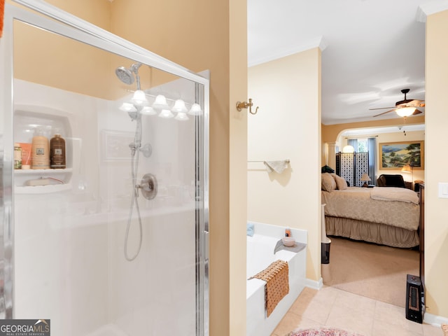 bathroom featuring crown molding, ceiling fan, plus walk in shower, and tile patterned flooring