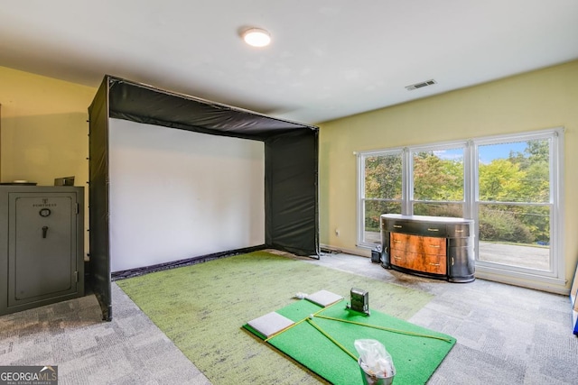 playroom with golf simulator and carpet flooring