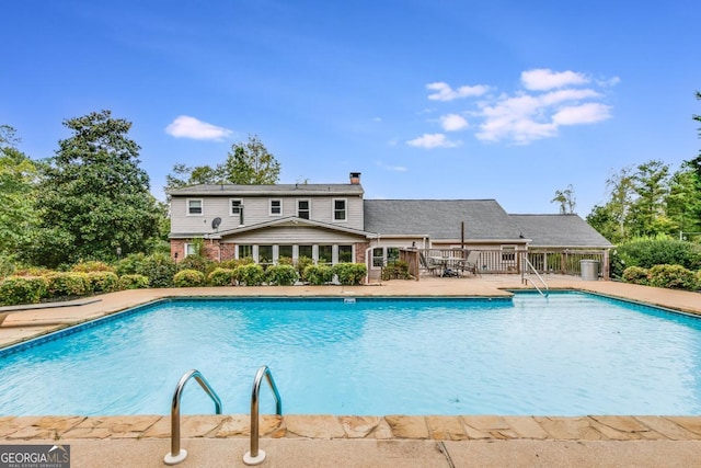 view of pool with a patio area