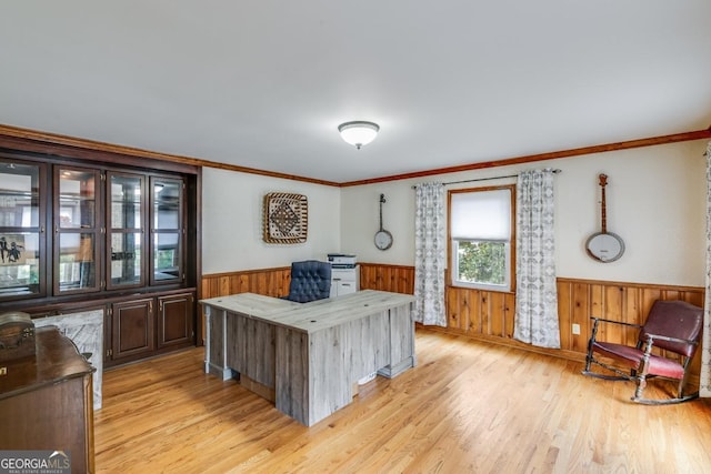 interior space with crown molding and light wood-type flooring