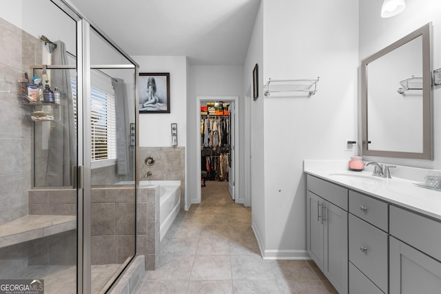 bathroom with vanity, separate shower and tub, and tile patterned floors