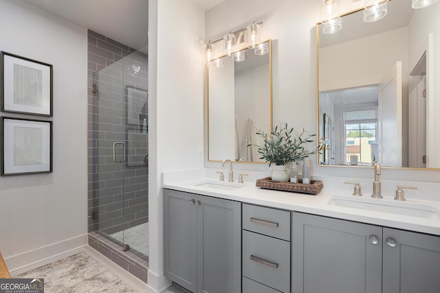 bathroom with vanity and an enclosed shower