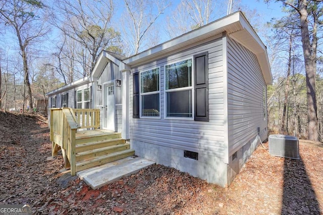 view of home's exterior featuring cooling unit