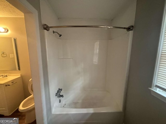 full bathroom with vanity, toilet, and shower / bathing tub combination