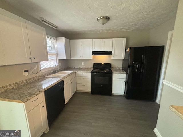 kitchen featuring white cabinetry, sink, dark wood-type flooring, and black appliances