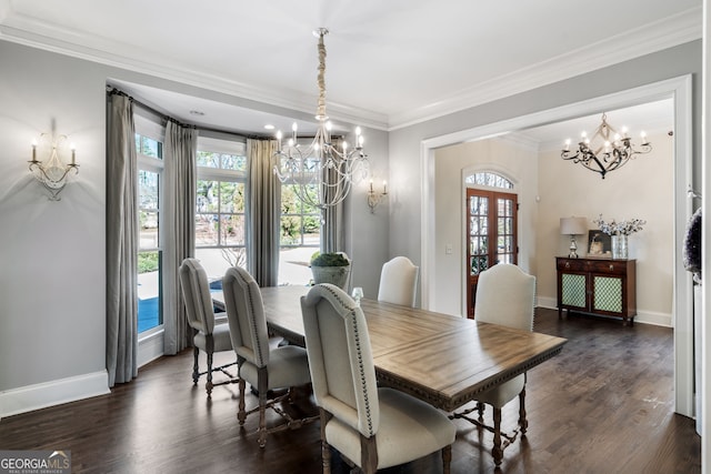 dining room featuring french doors, ornamental molding, dark hardwood / wood-style floors, and a notable chandelier