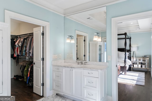 bathroom featuring vanity and crown molding