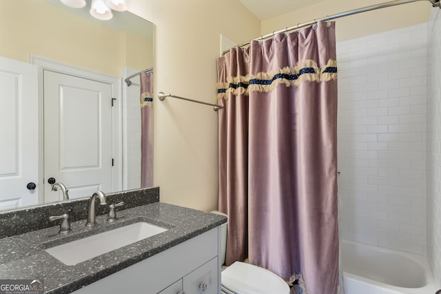 full bathroom featuring vanity, toilet, and shower / bath combo