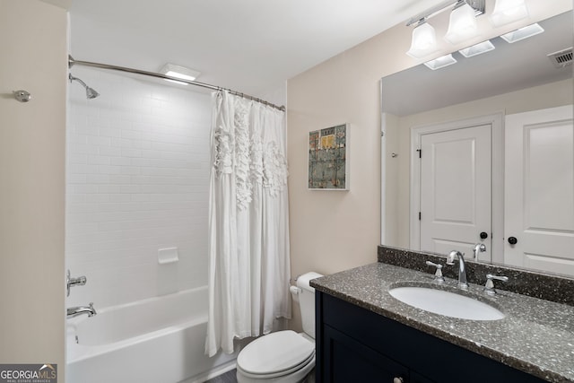 full bathroom with vanity, toilet, and shower / bath combo