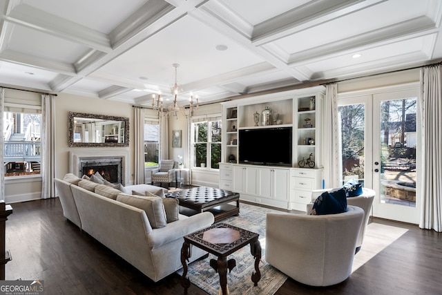 living room with coffered ceiling, a fireplace, dark hardwood / wood-style floors, and beamed ceiling