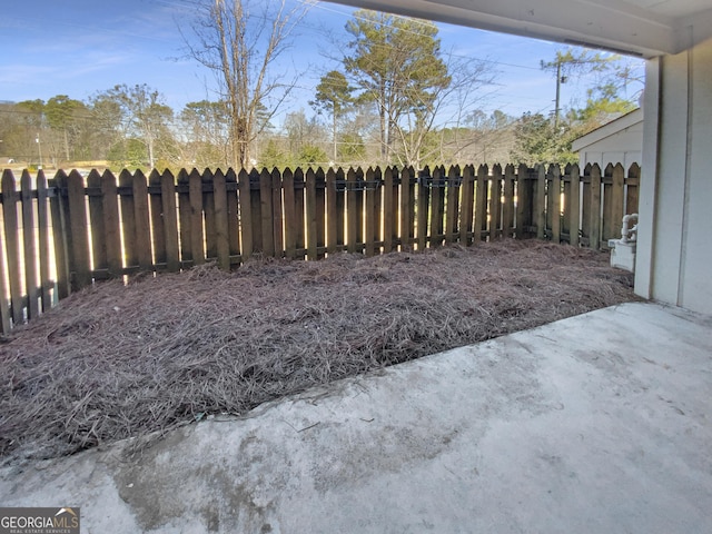 2064 Powers Ferry Trce SE, Marietta, GA 30067 - fenced backyard with a patio area
