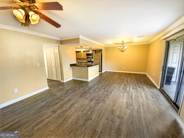 unfurnished living room featuring ornamental molding, dark hardwood / wood-style floors, and ceiling fan with notable chandelier