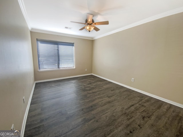 spare room featuring ornamental molding, dark hardwood / wood-style floors, and ceiling fan