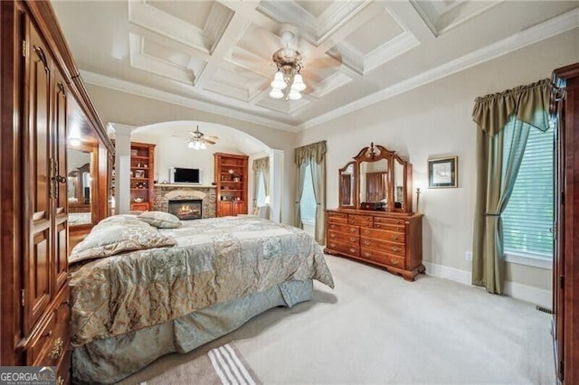 102 Townsend Pass, Alpharetta, GA 30004 - bedroom featuring decorative columns, a stone fireplace, light carpet, coffered ceiling, and baseboards