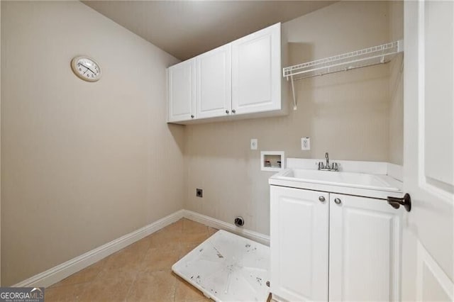 102 Townsend Pass, Alpharetta, GA 30004 - laundry area with hookup for an electric dryer, hookup for a washing machine, cabinet space, baseboards, and light tile patterned floors