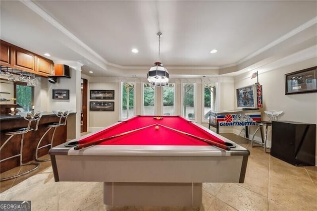 playroom featuring billiards, ornamental molding, and a raised ceiling