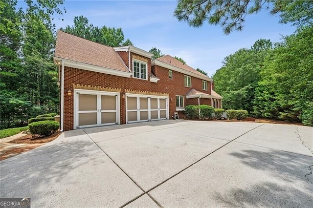 view of front of property featuring a garage