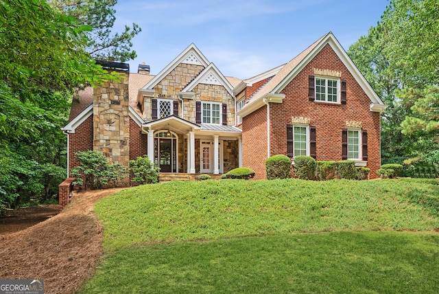 view of front of home with a front lawn